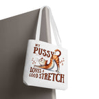 Fun stretching cat design on durable, reusable tote bag with multiple handle colors and sizes.