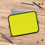 Yellow neoprene laptop sleeve with black trim, dual zipper, soft foam lining, waterproof and lightweight protection for laptops.