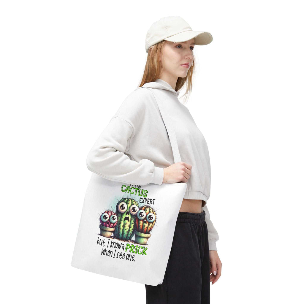 Fun cactus tote bag with cheeky design and multiple handle colors, made of durable spun polyester