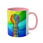 LGBTQ+ Pride mug with vibrant rainbow design and the phrase "Love is Love" featuring a raised fist graphic.
