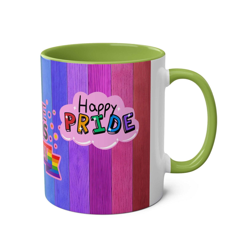 LGBTQ+ Pride Mug with vibrant rainbow design and green handle.