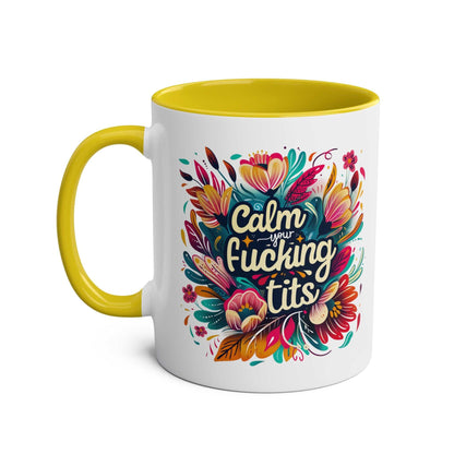 Colorful floral "Calm Your Tits" coffee mug with yellow interior and handle, sublimation printed, glossy finish, ceramic, microwave, and dishwasher safe.