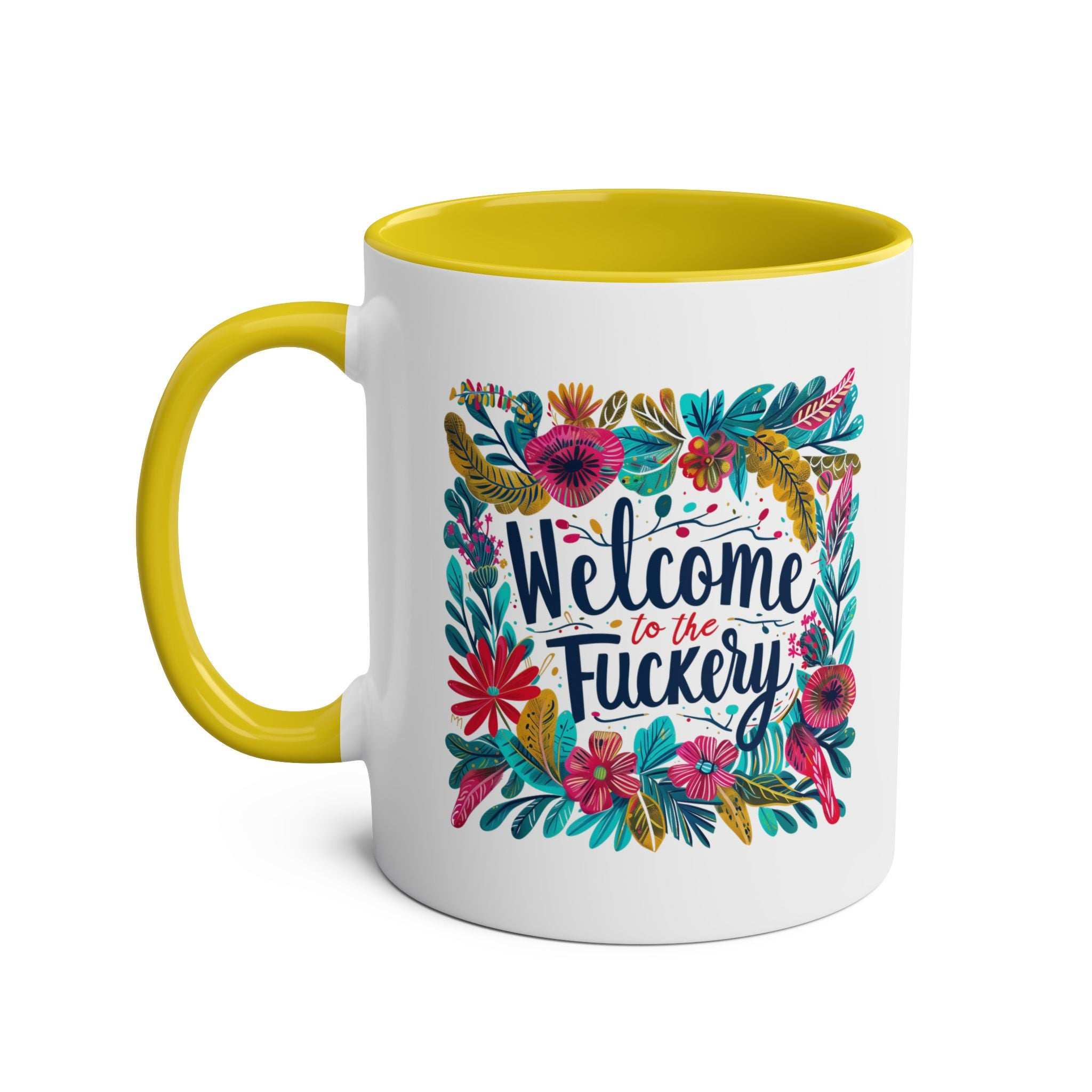 Cheeky "Welcome To The Fuckery" coffee mug with floral design, glossy finish, and yellow interior handle.