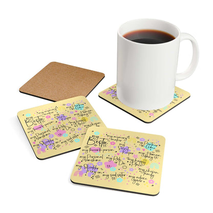 Bestie Yellow Coaster Set with mug and playful design on table.