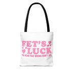 Pink heart tote bag with cheeky fun design, durable spun polyester, and multiple handle color options.