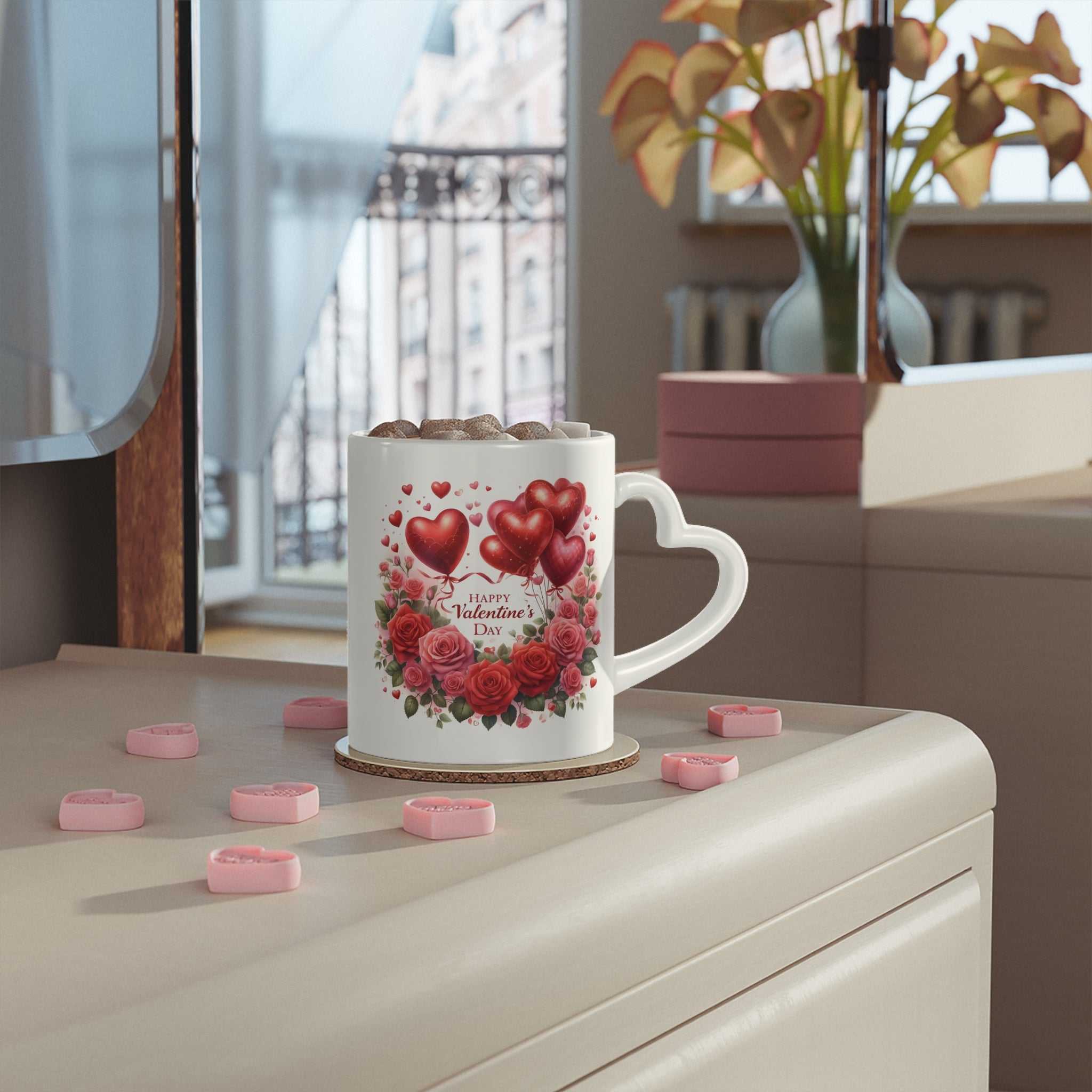 Gorgeous Valentines Day mug with heart-shaped handle and vibrant design on a countertop.