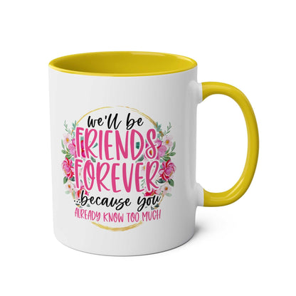 Friends Forever Coffee Mug with colorful floral design, yellow handle, glossy finish, and cheeky message.
