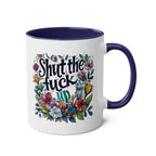 Shut The Fuck Up Coffee Mug with floral design and blue handle.