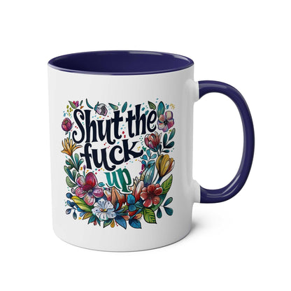 Shut The Fuck Up Coffee Mug with floral design and blue handle.