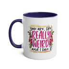 Really Weird Coffee Mug with floral design and humorous text, glossy finish, 11oz ceramic, blue handle and interior.