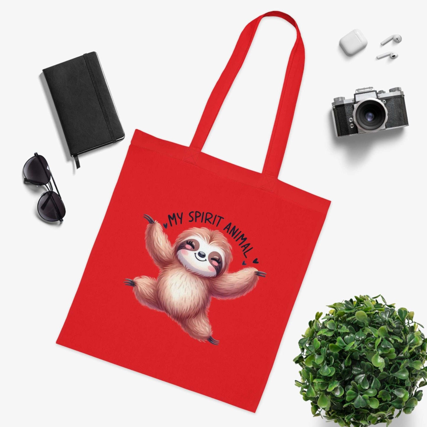 Cute sloth tote bag with vibrant design and red cotton fabric, perfect for daily use.