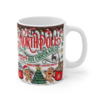 North Pole Christmas Mug with festive design, 11oz ceramic, glossy finish, microwave and dishwasher safe.