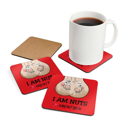 Cheeky "I Am Nuts About You" coaster set with high-gloss MDF top and cork back, shown with a coffee cup on one.