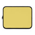 Bright lemon yellow neoprene laptop sleeve with soft foam lining and dual zipper closure