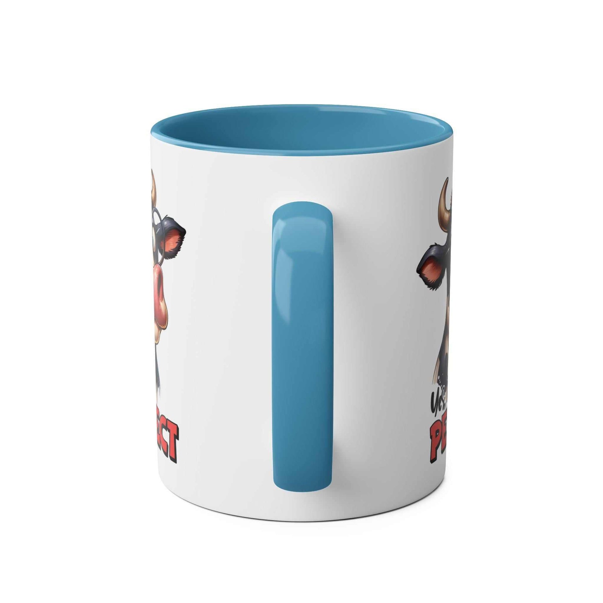 Cow design ceramic mug with blue handle and inside rim, "I Am Perfect" text, fun coffee mug, 11oz, microwave and dishwasher safe.