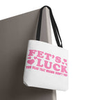 Pink heart tote bag with fun cheeky design and multiple handle color options