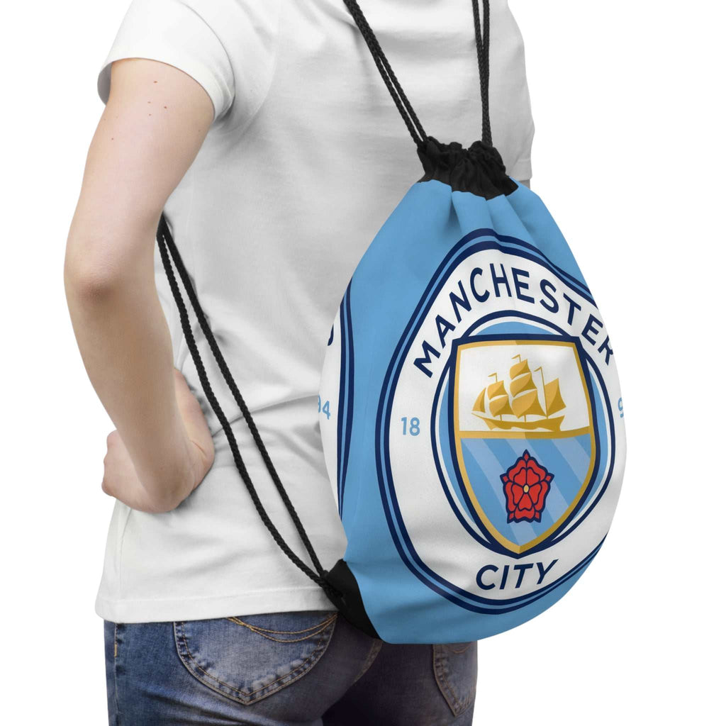 Manchester City drawstring bag in sky blue with club crest, lightweight polyester, ideal for sports and casual use