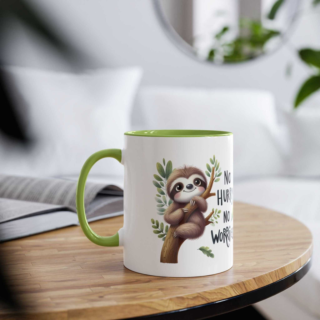 Cute sloth coffee mug with green interior and whimsical design on wooden table.
