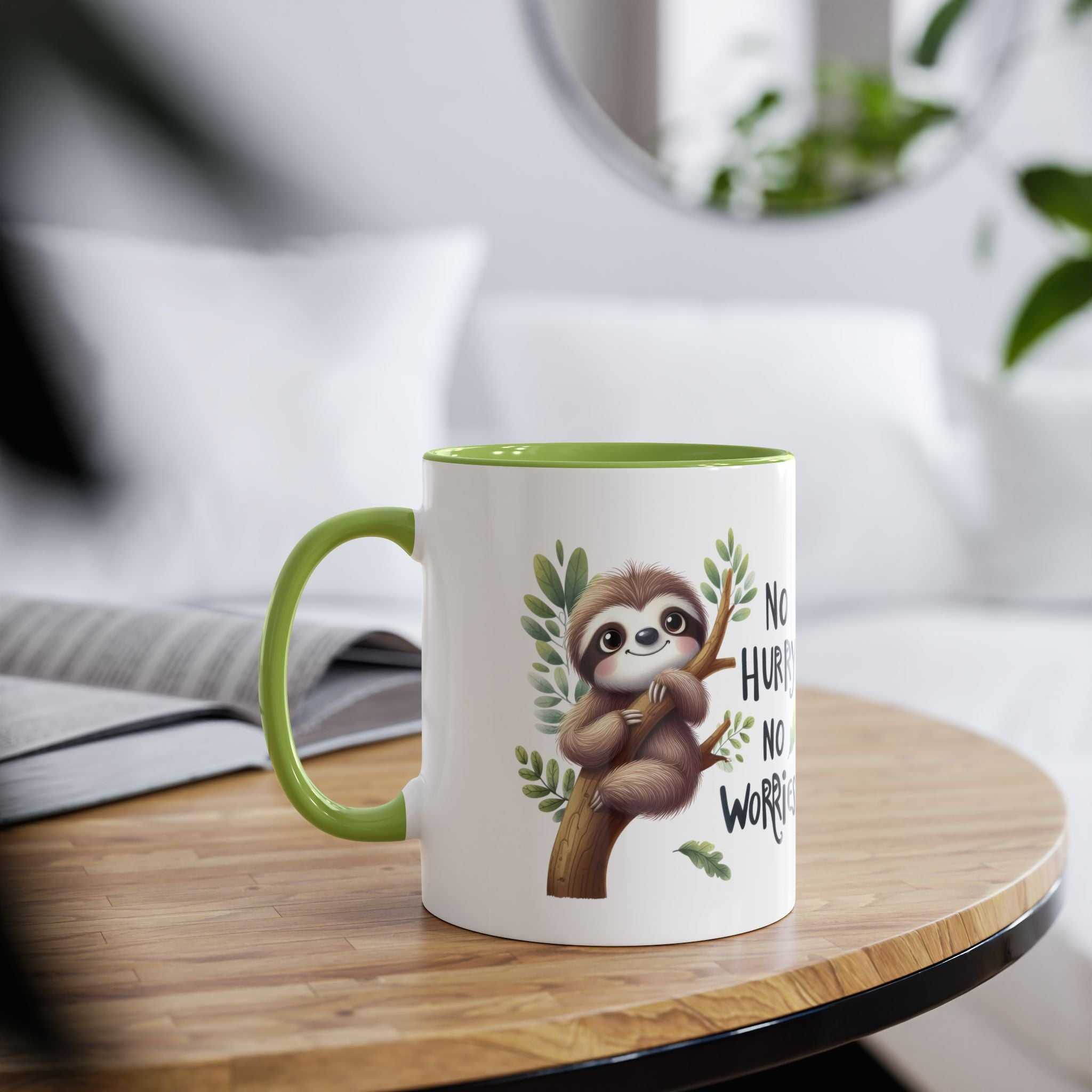 Cute sloth coffee mug with green interior and whimsical design on wooden table.