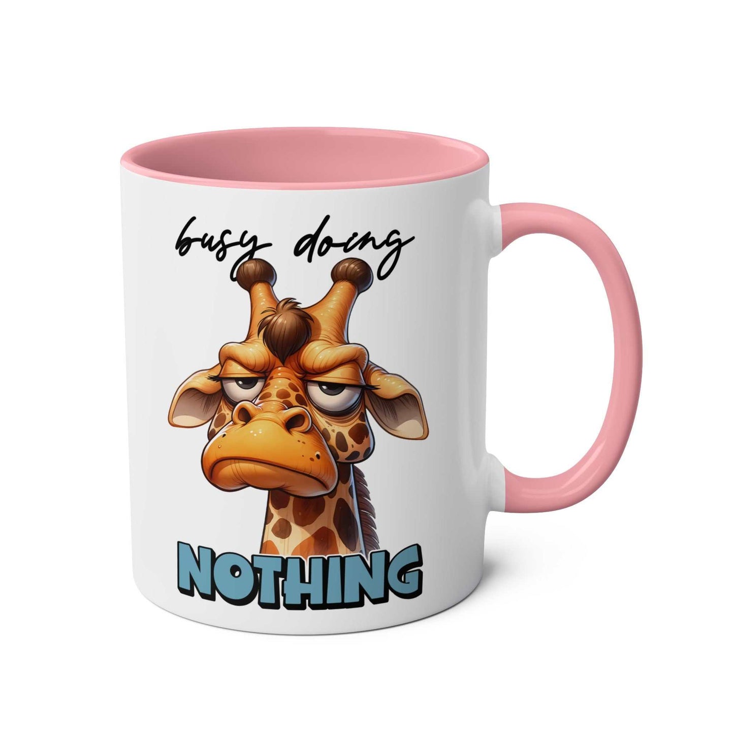 Giraffe-themed "Busy Doing Nothing" coffee mug in pink, perfect for morning humor.