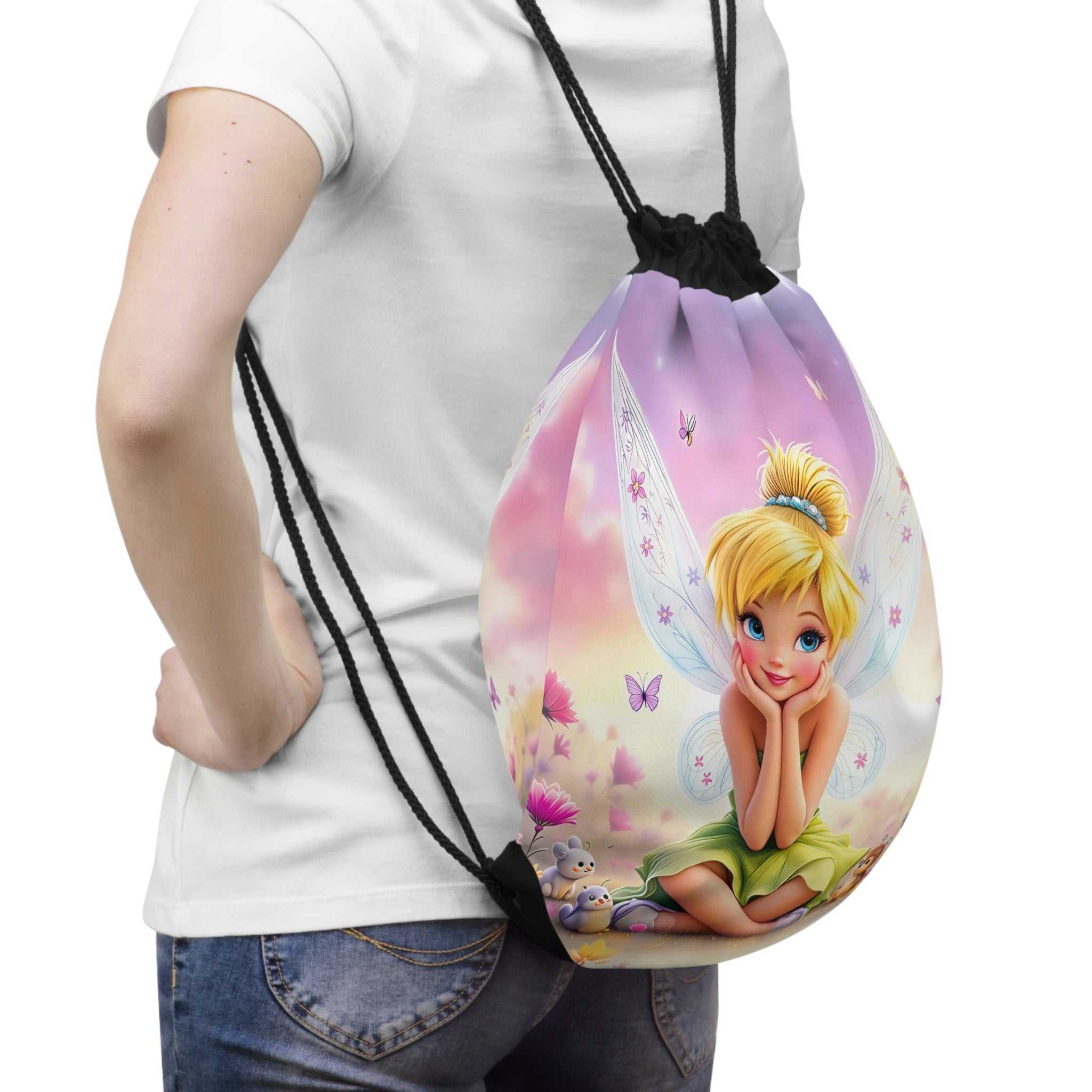 Child wearing a colorful Tinkerbell drawstring bag with black cords on white background