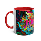 LGBTQ+ Pride Mug featuring vibrant rainbow design with "Joy, Love, Bliss" text on ceramic, red rim and handle.