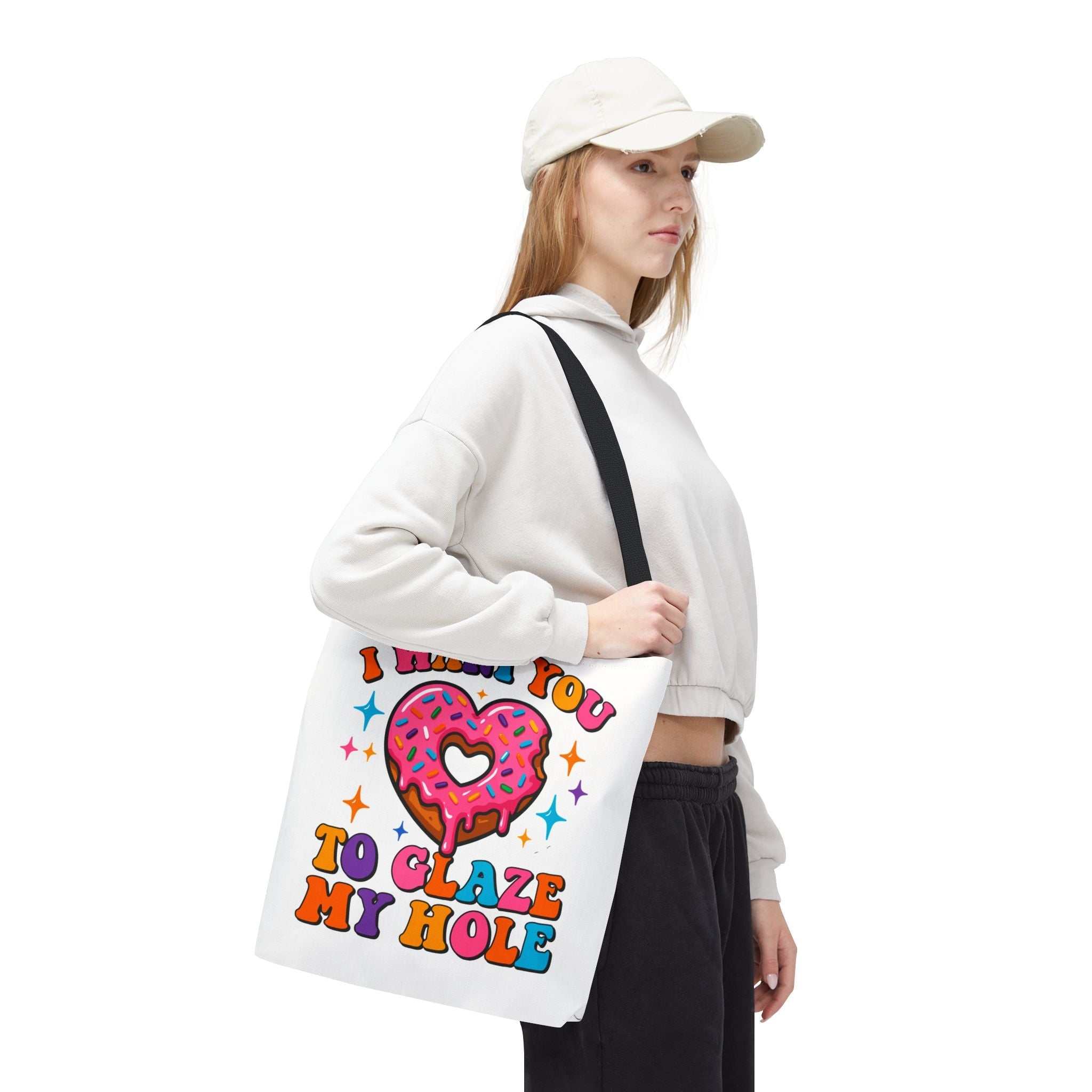 Glaze My Hole Donut Tote Bag with cheeky donut design, durable polyester, cotton straps, and multiple size options