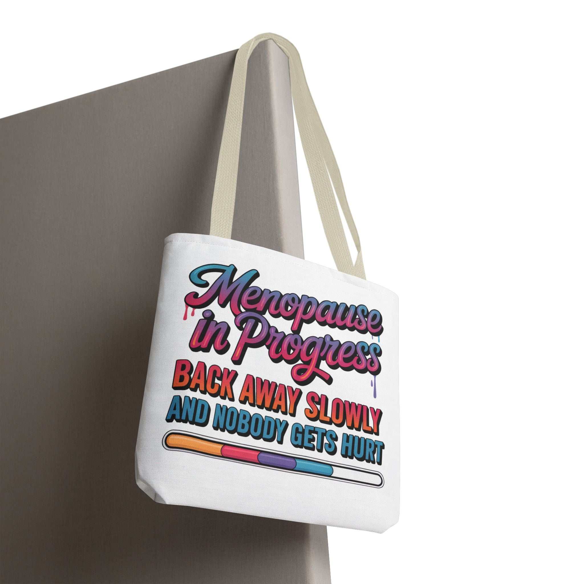 Menopause in Progress tote bag with cheeky design, durable polyester, multiple sizes and handle colors, perfect for daily use