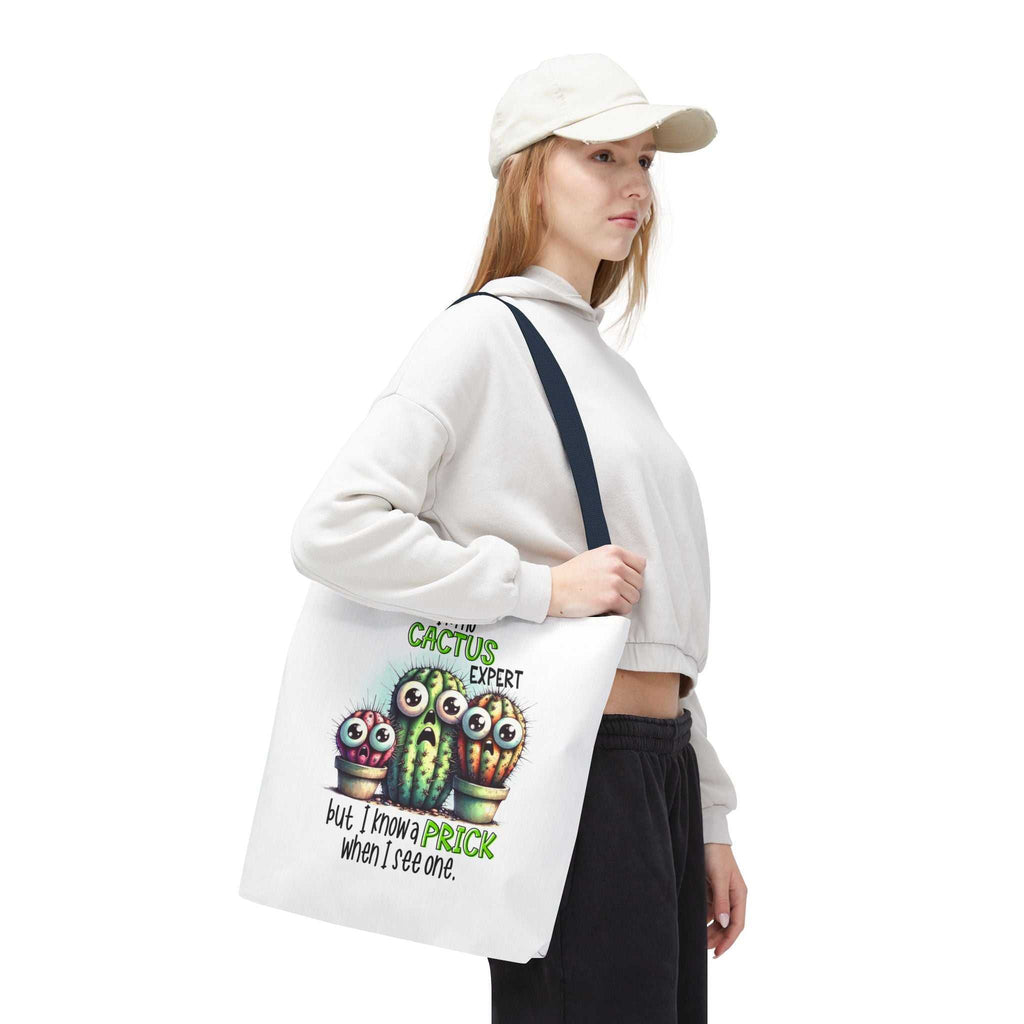 Fun cactus tote bag with cheeky design, durable spun polyester, multiple sizes and handle colors for everyday use