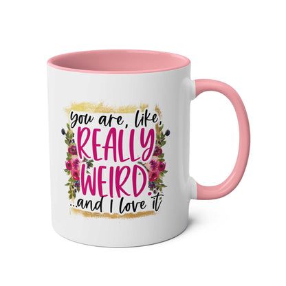 really weird coffee mug with pink interior and humorous text