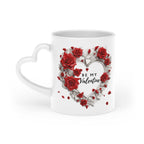 Gorgeous Valentines Day mug with heart-shaped handle and vibrant rose design.