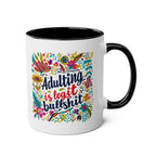 Adulting Is Bullshit Coffee Mug with colorful floral design, fun and cheeky, 11oz ceramic, microwave and dishwasher safe.
