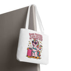Cheeky fun unicorn travel tote bag with colorful handles and durable spun polyester fabric
