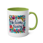 Colorful "Welcome To The Fuckery" coffee mug with floral design and green interior.