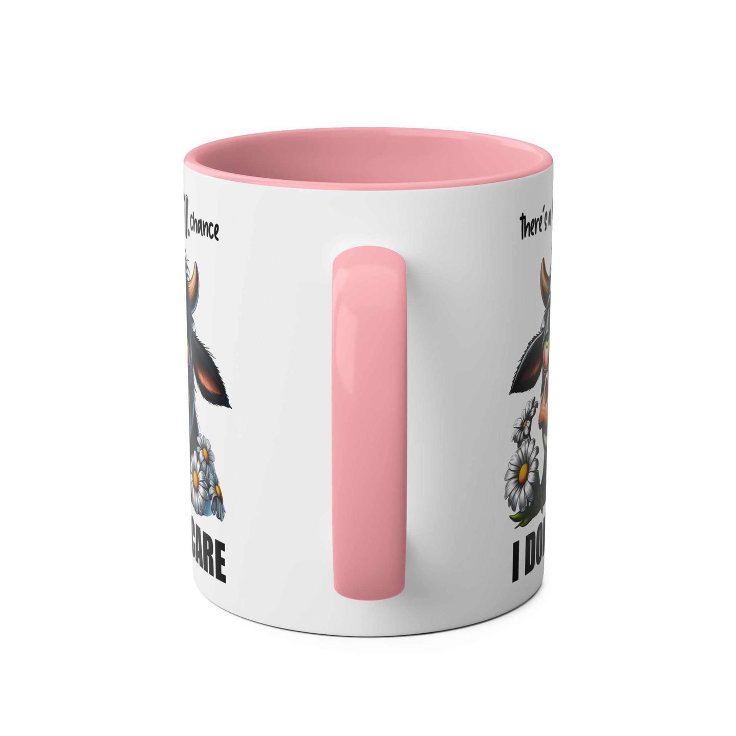 I Dont Care Coffee Mug with pink handle and quirky cow design.