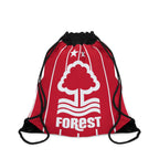 Nottingham Forest drawstring bag in red with white tree crest and black cords, lightweight polyester for sports and travel.