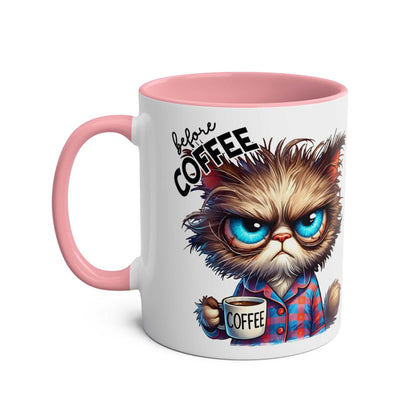 Fun sarcastic coffee mug with cartoon cat design, pink handle, and glossy finish.