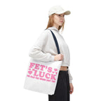 Pink heart tote bag with cheeky fun design and multiple handle colors, made of durable spun polyester