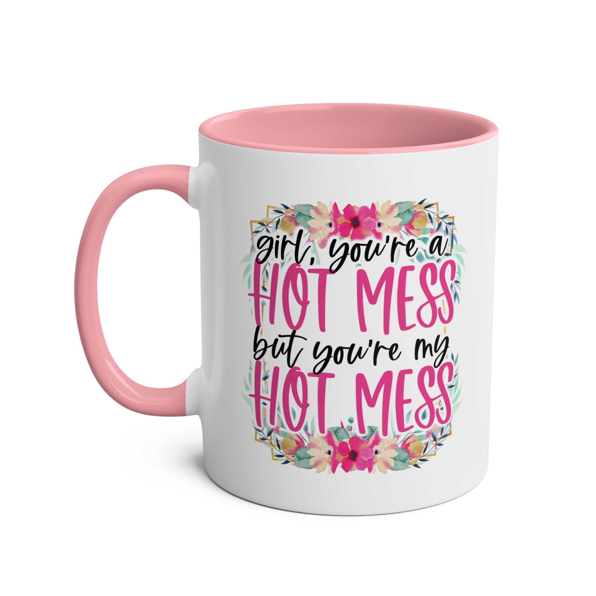 Hot Mess Coffee Mug with pink handle, colorful floral design, and playful slogan.