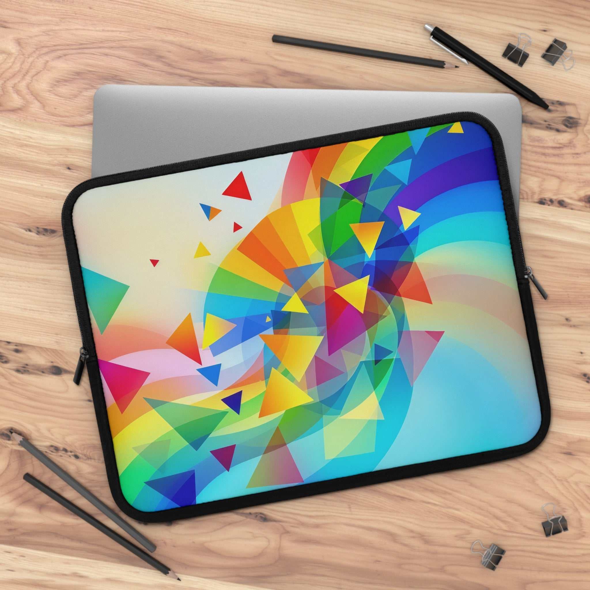Colorful geometric pride design laptop sleeve made of durable neoprene with soft foam lining and dual zipper closure.