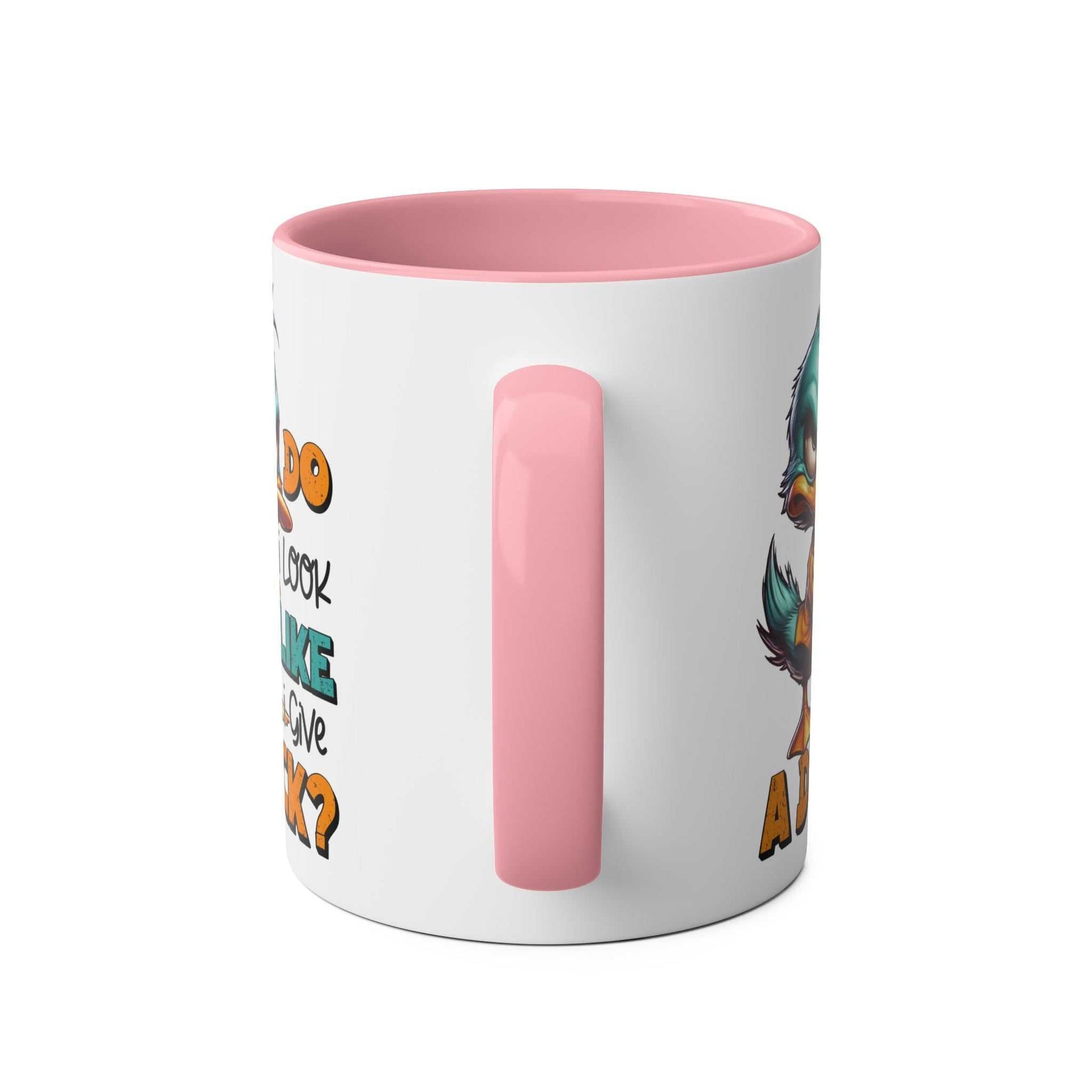 Playful duck design on Give A Duck Coffee Mug with pink handle and interior.