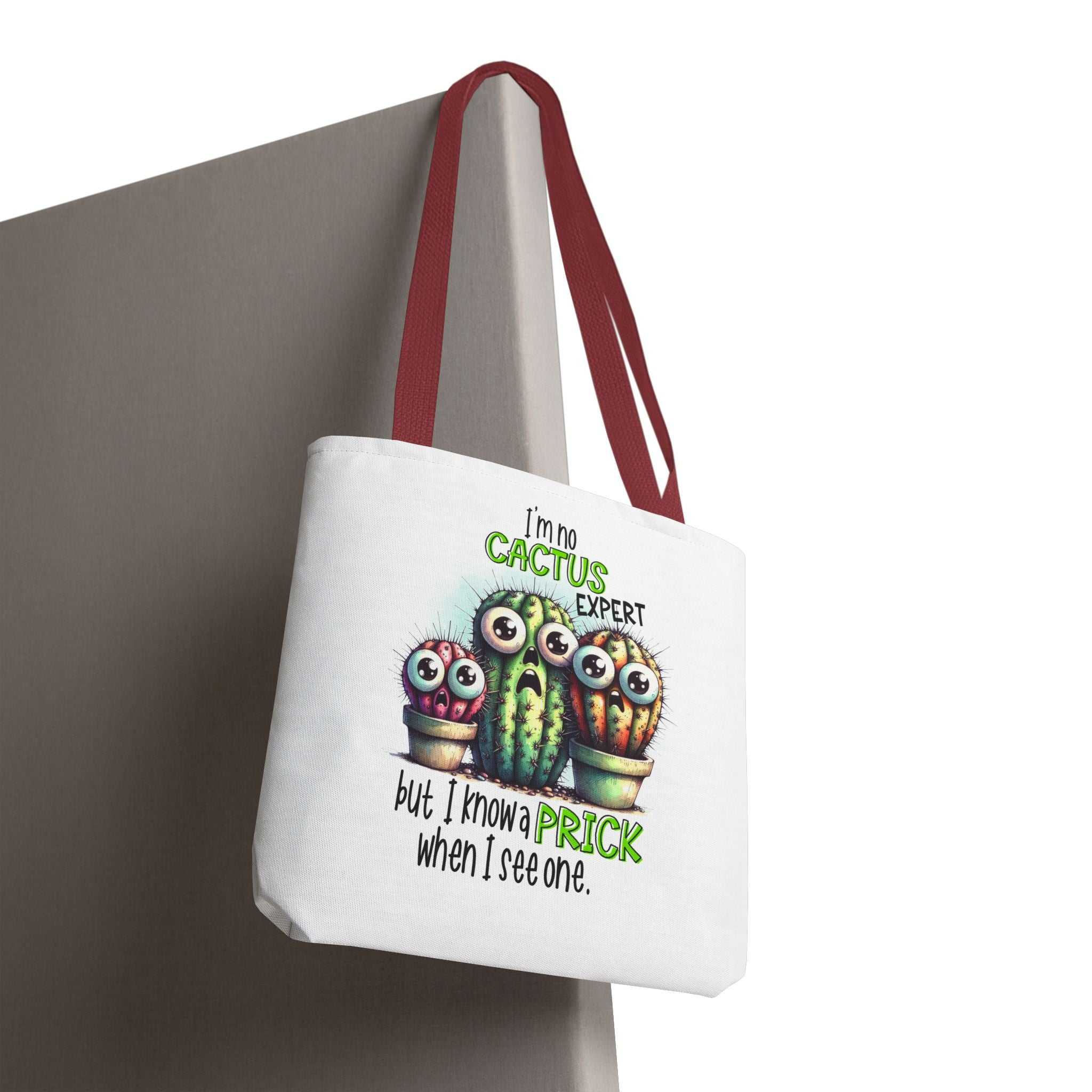 Fun cactus tote bag with cheeky design, durable spun polyester, multiple sizes and handle colors for everyday use