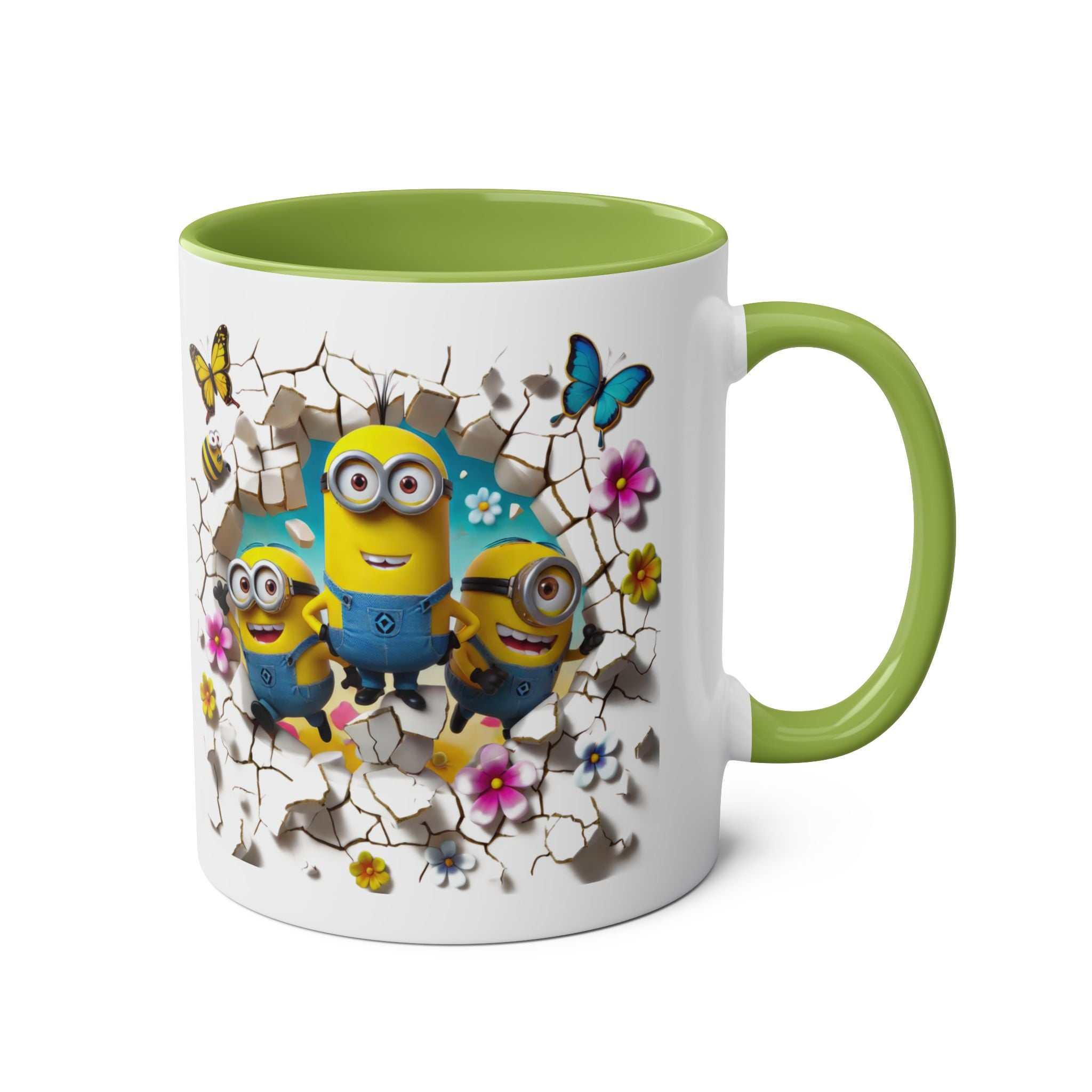 Fun Minion themed coffee mug with green handle and playful character design.