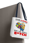Funny Minion tote bag with cheeky design, durable polyester, and multiple handle color options.