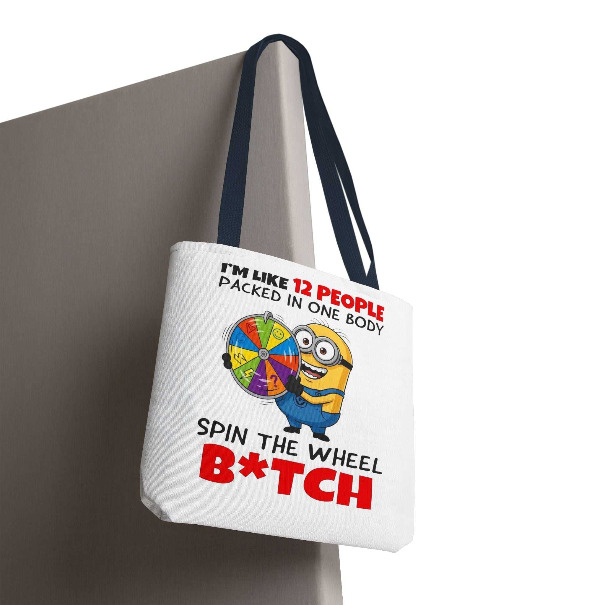Funny Minion tote bag with cheeky design, durable polyester, and multiple handle color options.