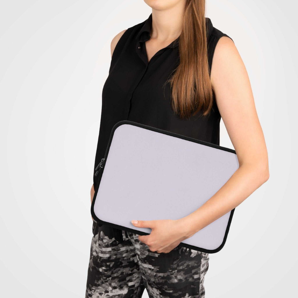 woman holding lavender neoprene laptop sleeve with dual zipper and soft foam lining