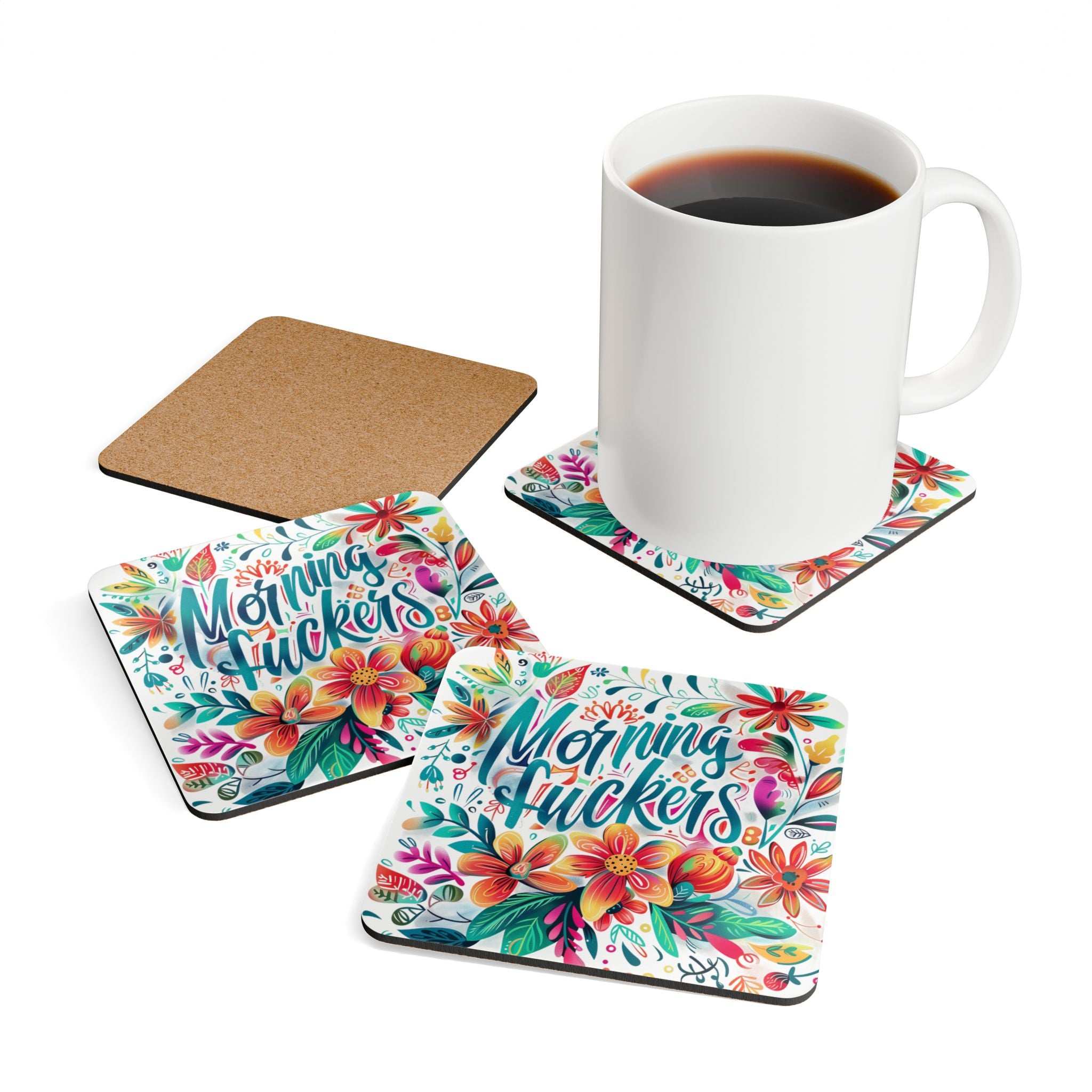 Colorful "Morning Fuckers" coaster set with floral design, cork backing, and high-gloss finish, displayed with a white mug.