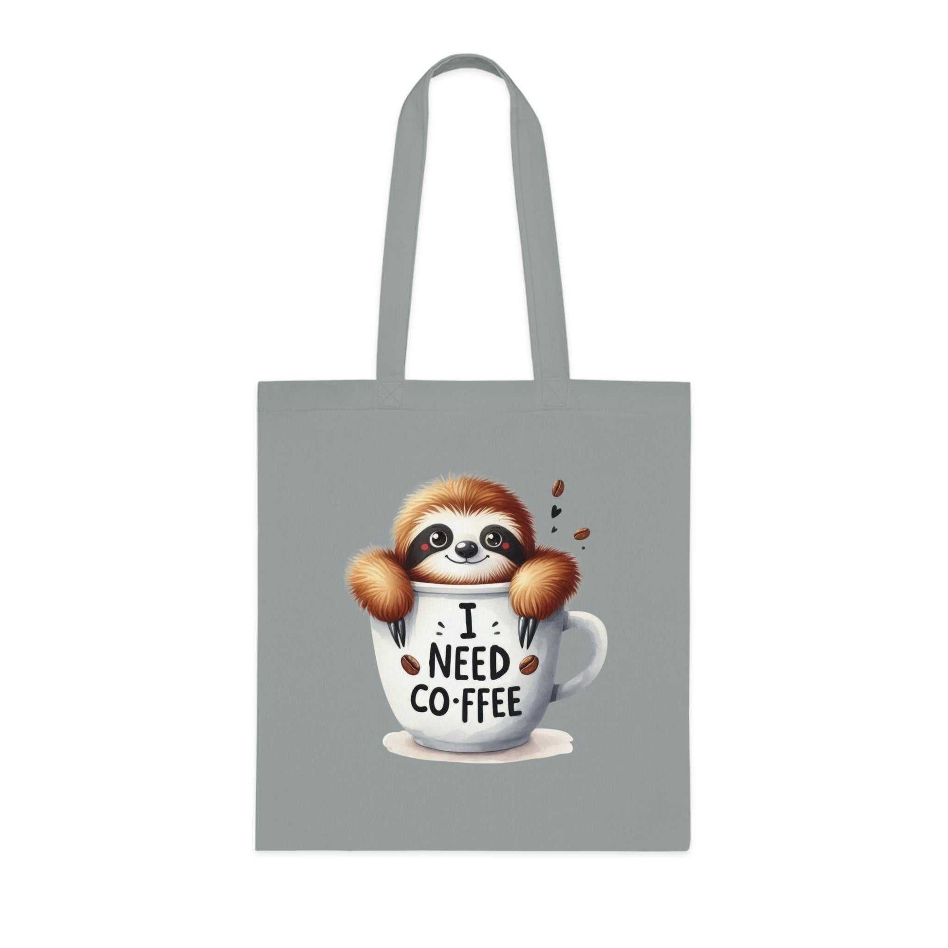 Cute sloth tote bag with "I Need Coffee" design, 100% cotton, perfect for shopping and gifting.