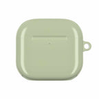Sage green hard shell AirPods protective case with glossy finish and wireless charging compatibility
