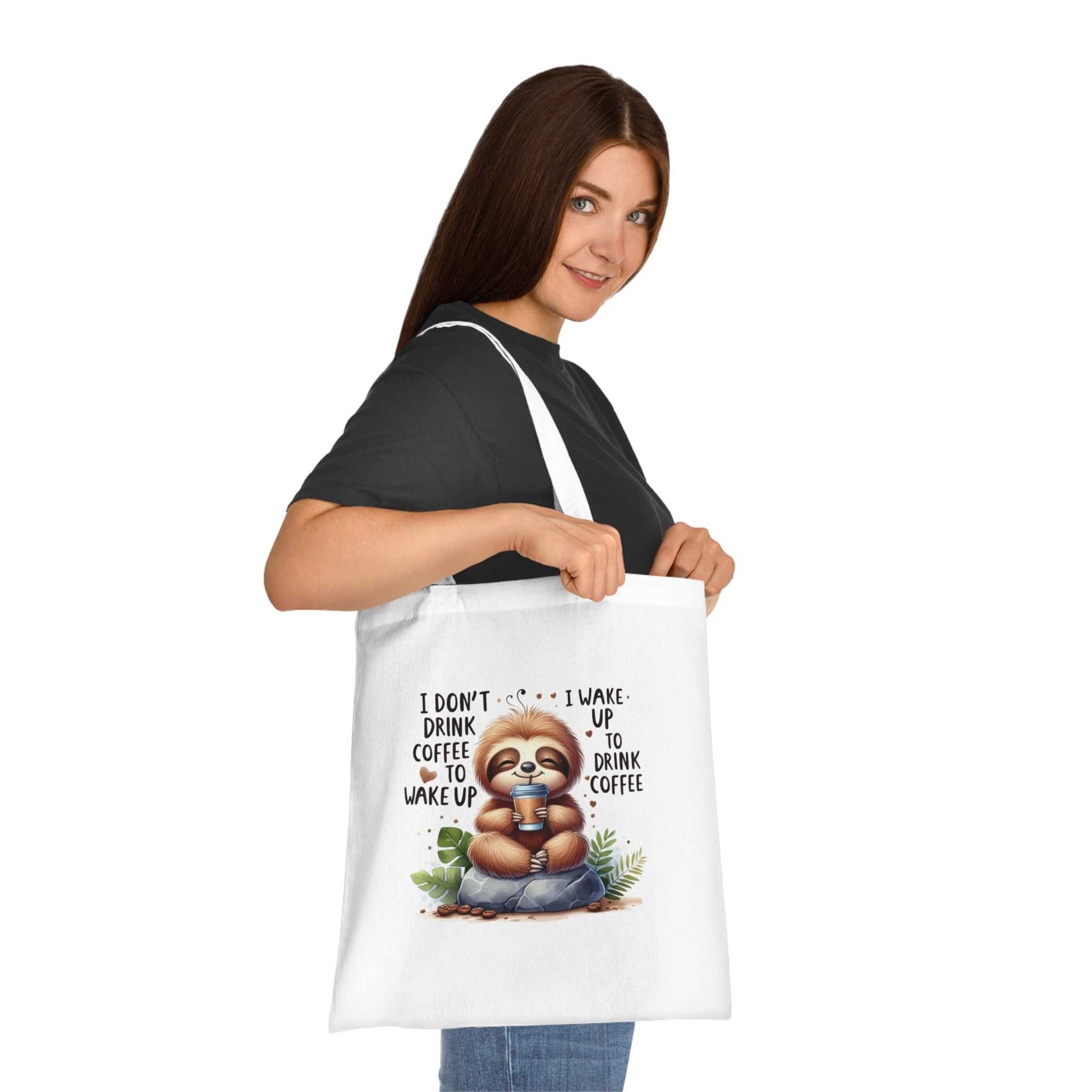 Cotton tote bag with cute sloth design, vibrant colors, and durable 100% cotton fabric.